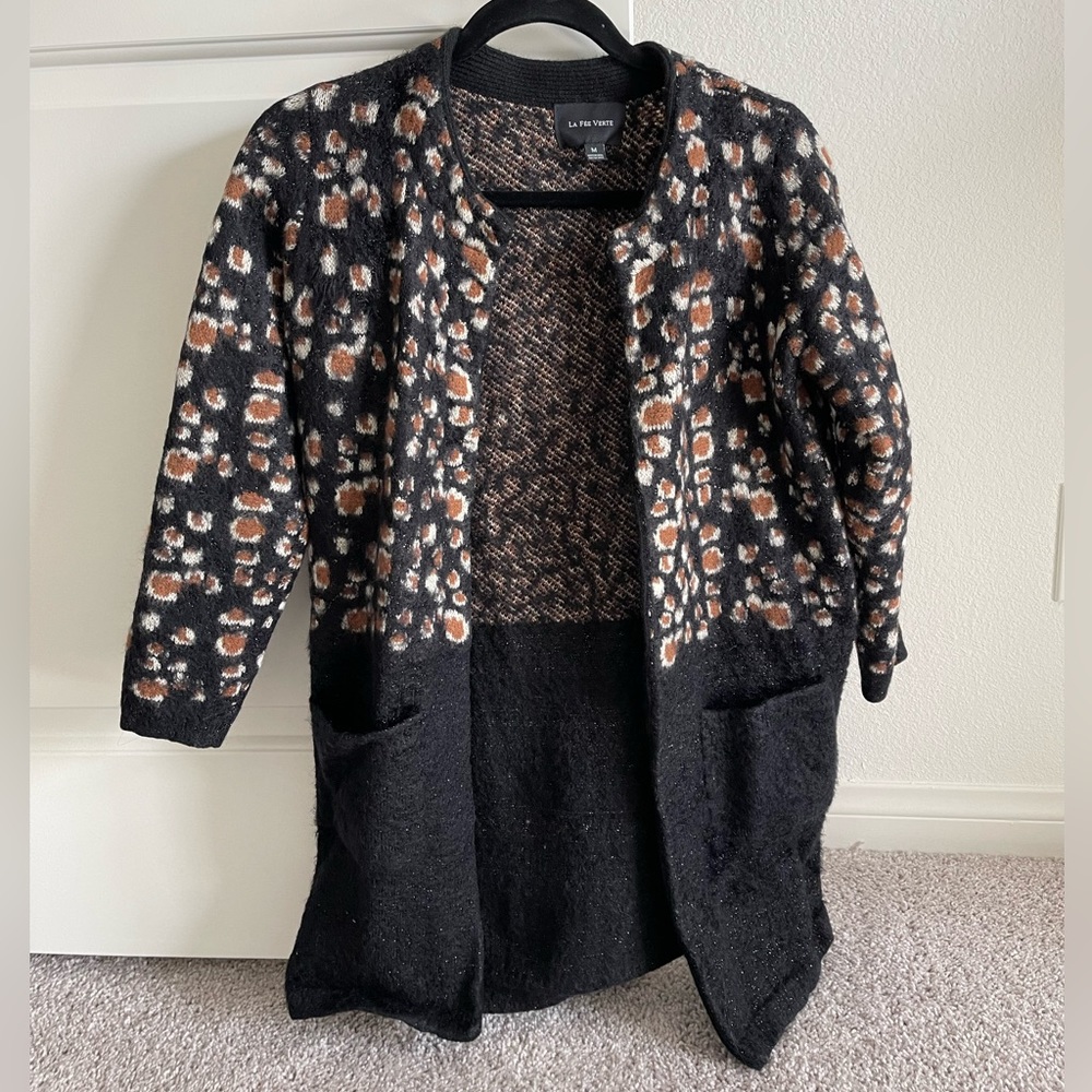 La Anthropologie La Fee Verte Feathered Leo Eyelash
Leopard Cardigan Medium